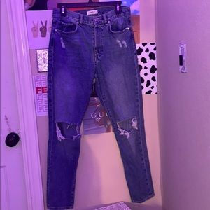 Distressed boyfriend jeans.